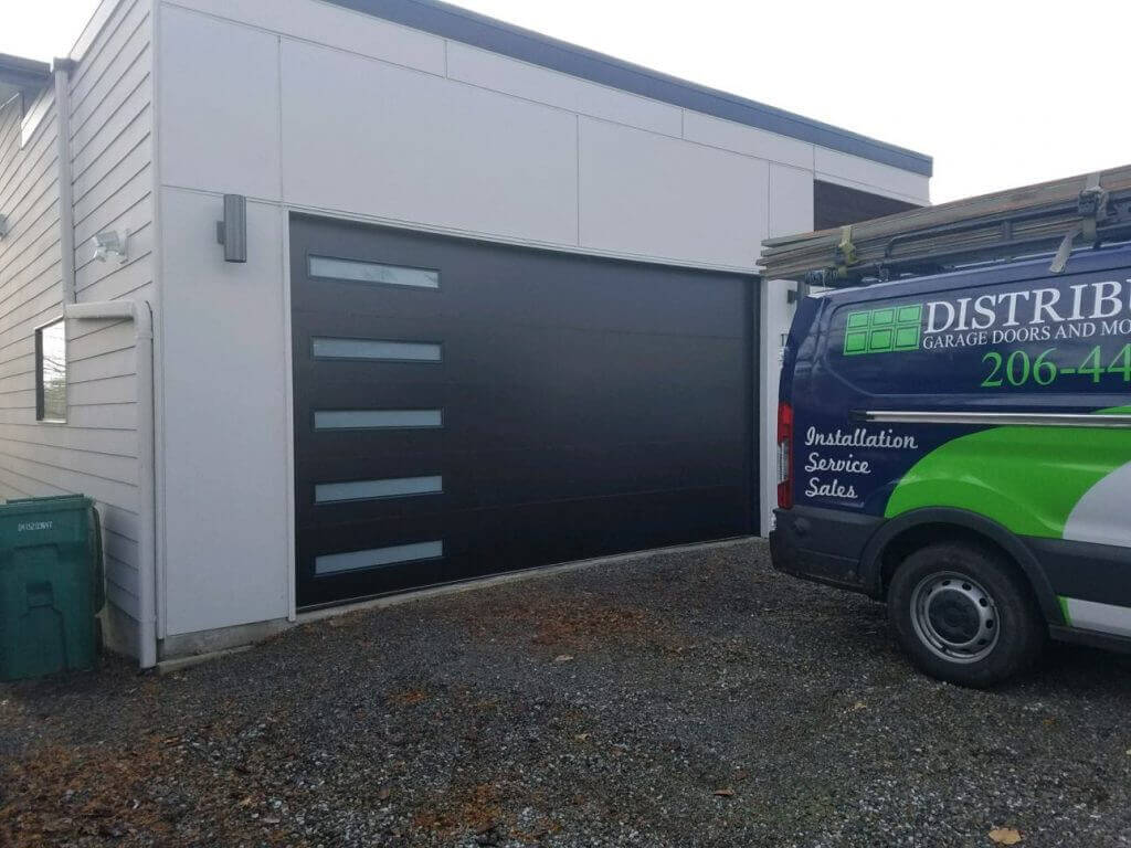 black modern tech garage doors with narrow frosted windows